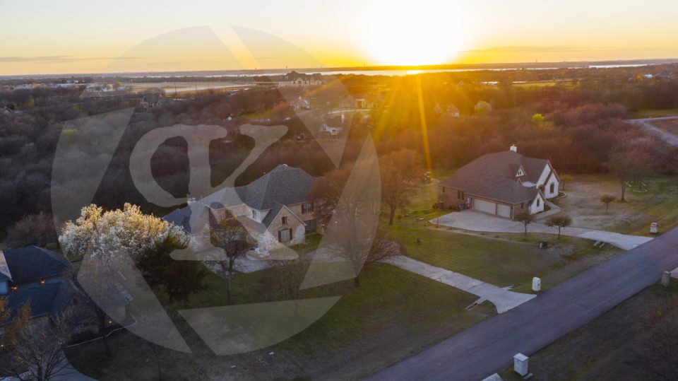 Aerial shot of a neighborhood at sunset